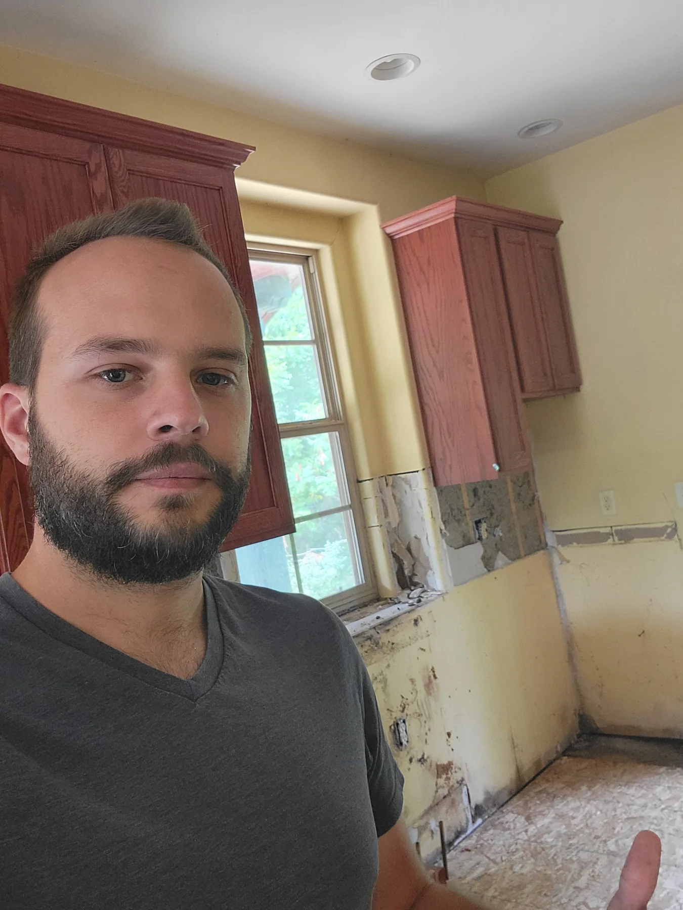 Alex Craig inside a house during repair and renovation work